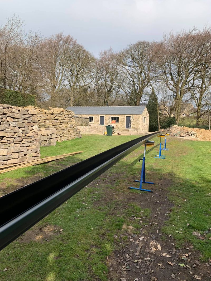 Anthracite-Grey-Gutter-install-Howarth-Yorkshire...-Man-ca.jpeg