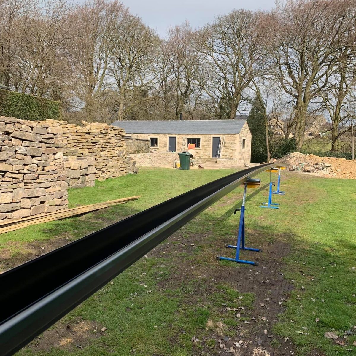 Anthracite-Grey-Gutter-install-Howarth-Yorkshire...-Man-ca.jpeg