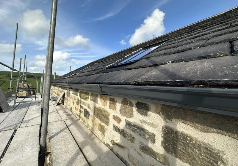 Anthracite-Ral-7016-aluminium-seamless-guttering-installed-t.jpg